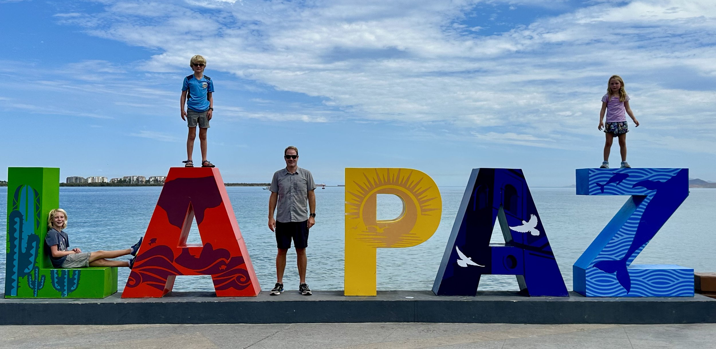 Us posing with the La Paz sign